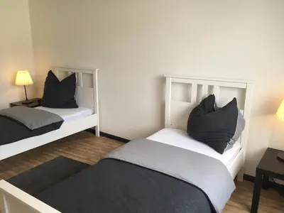 Ein Bett oder Betten in einem Zimmer der Unterkunft Monteurhome-Hagen