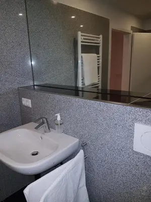 Ein Badezimmer in der Unterkunft Wohnen im Souterrain einer Villa