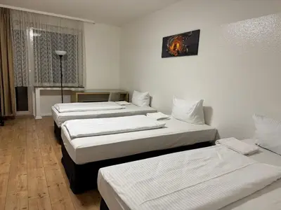Ein Bett oder Betten in einem Zimmer der Unterkunft Bismarck Bach Apartments