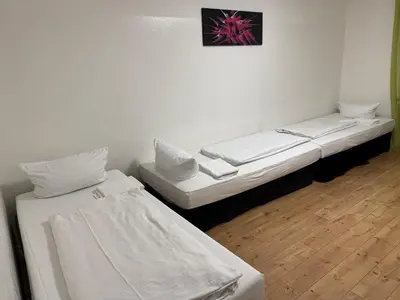 Ein Bett oder Betten in einem Zimmer der Unterkunft Bismarck Bach Apartments