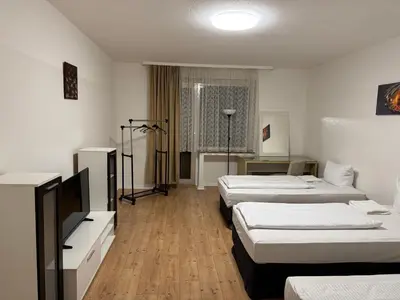 Ein Bett oder Betten in einem Zimmer der Unterkunft Bismarck Bach Apartments