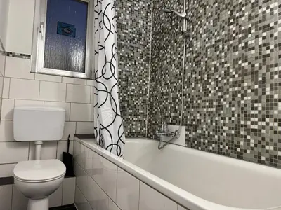 Ein Badezimmer in der Unterkunft Bismarck Bach Apartments
