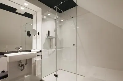 Ein Badezimmer in der Unterkunft Schulhaus Hotel