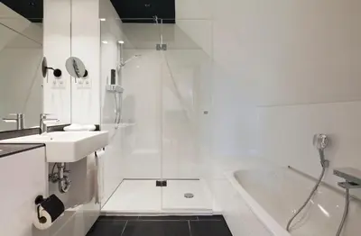 Ein Badezimmer in der Unterkunft Schulhaus Hotel