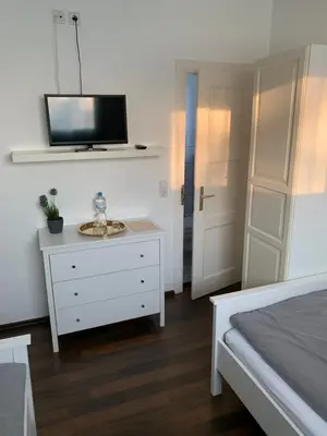 Ein Bett oder Betten in einem Zimmer der Unterkunft Zum armen Mann