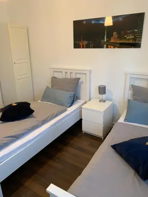 Ein Bett oder Betten in einem Zimmer der Unterkunft Zum armen Mann