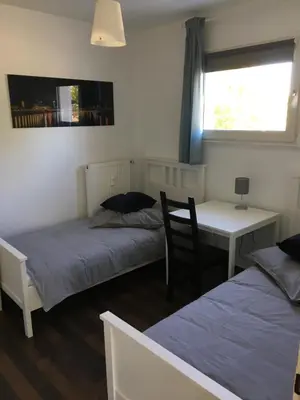 Ein Bett oder Betten in einem Zimmer der Unterkunft Zum armen Mann