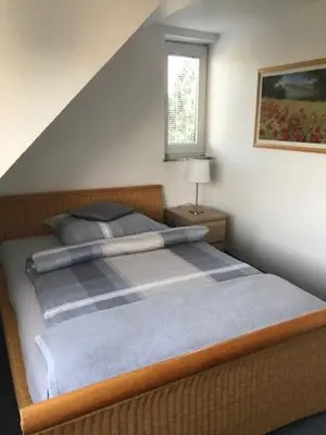 Ein Bett oder Betten in einem Zimmer der Unterkunft Messewohnung Düsseldorf-Nord