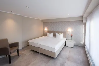 Ein Bett oder Betten in einem Zimmer der Unterkunft Appartements am Kleeblatt