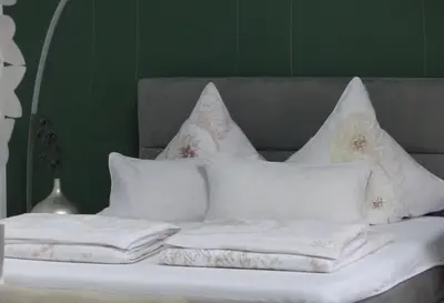Ein Bett oder Betten in einem Zimmer der Unterkunft Prinz Ole