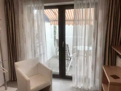 Ein Sitzbereich in der Unterkunft Apartmentvermietung Meerbusch
