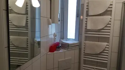 Ein Badezimmer in der Unterkunft Gästehaus Grupello