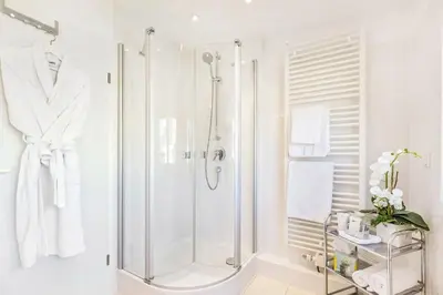 Ein Badezimmer in der Unterkunft Hotel Villa Falkenberg