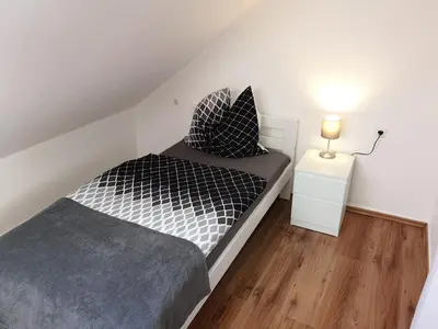 Ein Bett oder Betten in einem Zimmer der Unterkunft Lüdenscheid-Ferienwohnung de Betzler Weh29-100