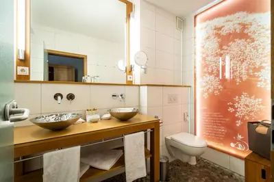 Ein Badezimmer in der Unterkunft Waldhotel Tannenhäuschen