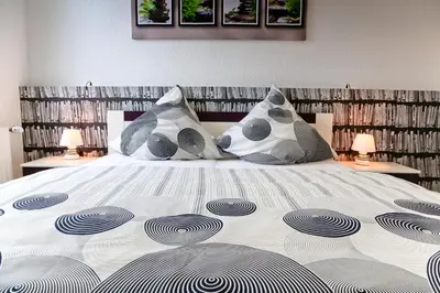 Ein Bett oder Betten in einem Zimmer der Unterkunft Suite-Apartment-Essen