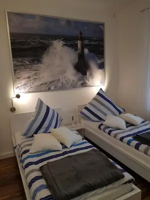 Ein Bett oder Betten in einem Zimmer der Unterkunft Fewo Faubel Centro 44 m2