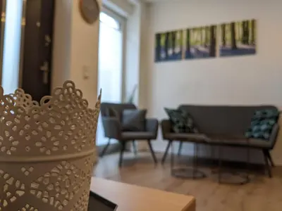 Ein Sitzbereich in der Unterkunft 1 Zimmer Apartment Ratingen Ost