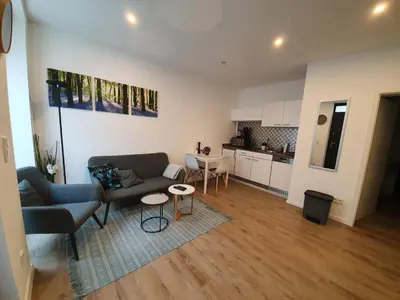 Ein Sitzbereich in der Unterkunft 1 Zimmer Apartment Ratingen Ost