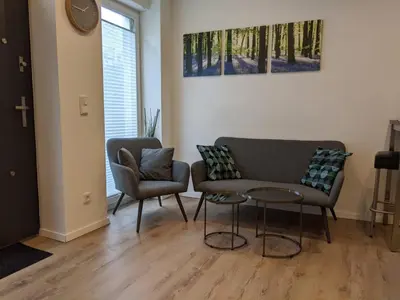 Ein Sitzbereich in der Unterkunft 1 Zimmer Apartment Ratingen Ost