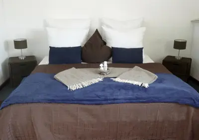 Ein Bett oder Betten in einem Zimmer der Unterkunft Hotel Zum Bügeleisen