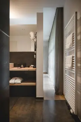 Ein Bett oder Betten in einem Zimmer der Unterkunft Golfhotel Gut Neuenhof