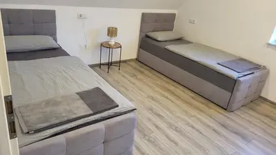 Ein Bett oder Betten in einem Zimmer der Unterkunft Apartment Home in NRW