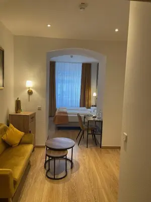 Ein Sitzbereich in der Unterkunft Hotel Am Mühlenteich