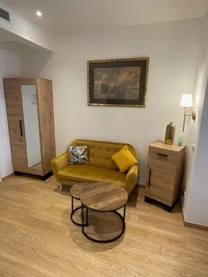Ein Sitzbereich in der Unterkunft Hotel Am Mühlenteich
