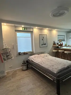 Ein Bett oder Betten in einem Zimmer der Unterkunft Stilvolles Appartement