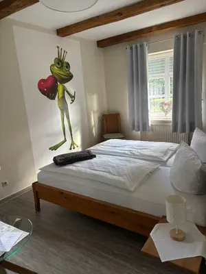 Ein Bett oder Betten in einem Zimmer der Unterkunft Hotel Gasthof Kruse