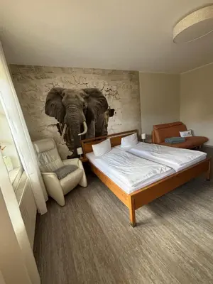 Ein Bett oder Betten in einem Zimmer der Unterkunft Hotel Gasthof Kruse