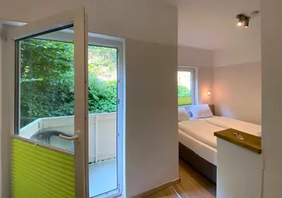 Ein Bett oder Betten in einem Zimmer der Unterkunft also-Hotel an der Hardt