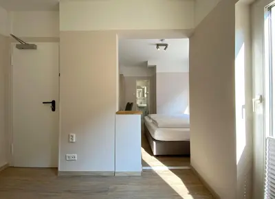 Ein Bett oder Betten in einem Zimmer der Unterkunft also-Hotel an der Hardt