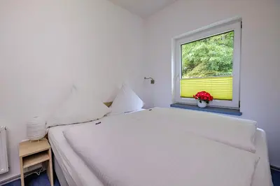 Ein Bett oder Betten in einem Zimmer der Unterkunft also-Hotel an der Hardt