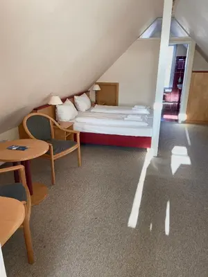 Ein Bett oder Betten in einem Zimmer der Unterkunft Boutique Hotel Villa Stockum