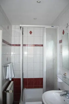 Ein Badezimmer in der Unterkunft Boutique Hotel Villa Stockum