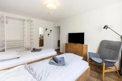 Ein Bett oder Betten in einem Zimmer der Unterkunft Glück Auf Appartements Am Stadtpark Duisburg