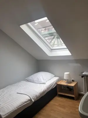 Ein Bett oder Betten in einem Zimmer der Unterkunft Hotel Schwaferts