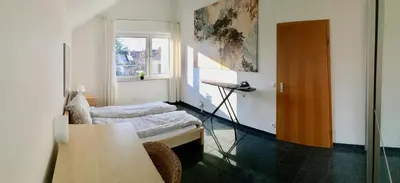 Ein Bett oder Betten in einem Zimmer der Unterkunft Bredeneyer Straße 66A