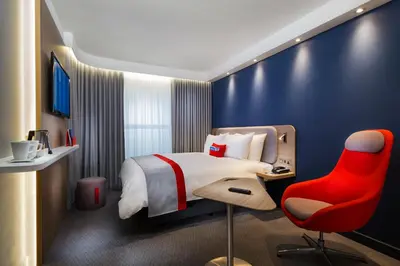 Ein Bett oder Betten in einem Zimmer der Unterkunft Holiday Inn Express Oberhausen by IHG
