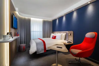 Ein Bett oder Betten in einem Zimmer der Unterkunft Holiday Inn Express Oberhausen by IHG