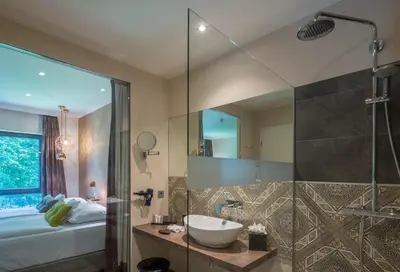 Ein Badezimmer in der Unterkunft Park Villa Hotel