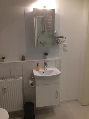 Ein Badezimmer in der Unterkunft Töfte Bude