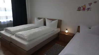 Ein Bett oder Betten in einem Zimmer der Unterkunft Altstadt