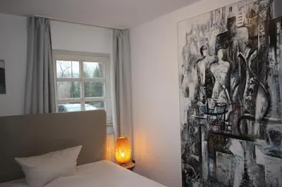 Ein Bett oder Betten in einem Zimmer der Unterkunft Hotel Nüller Hof