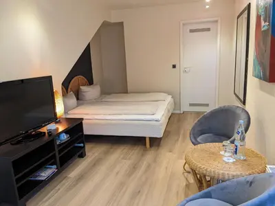 Ein Bett oder Betten in einem Zimmer der Unterkunft Hotel Nüller Hof