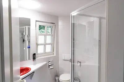 Ein Badezimmer in der Unterkunft Hotel Nüller Hof