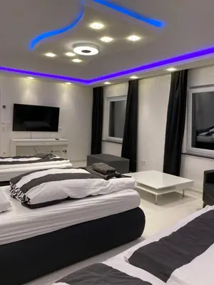 Ein Bett oder Betten in einem Zimmer der Unterkunft Aparts House Essen - Balkon - Free Parking- WiFi - Kitchen