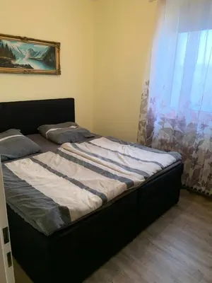 Ein Bett oder Betten in einem Zimmer der Unterkunft Feuerbachstr.9 Ferienwohnung